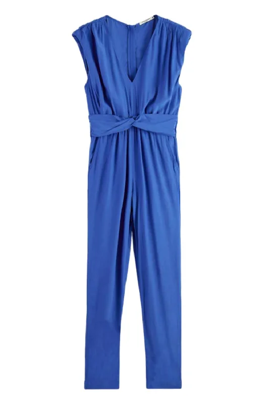 women's distressed pantsBelted V Neck Jumpsuit In Bright Blue